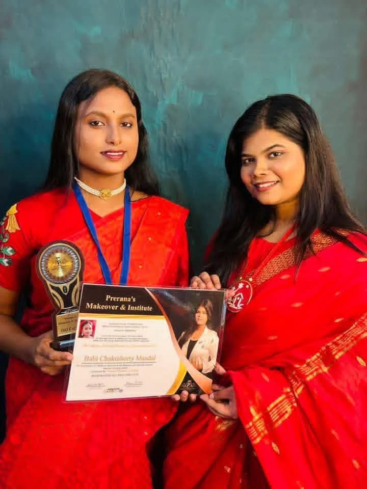 Successful student graduate posing with their certified license for Beautician Course - Graduate Moment 4